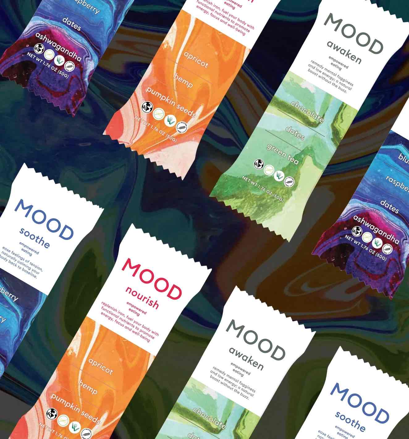 Various packets of MOOD bars with different flavors on a colorful background